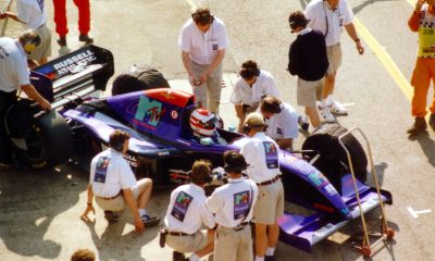 This is an image of Roland Ratzenberger within his car, courtesy of Sgozzi - Own work