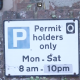Permit sign. Text says: "Permit holders only Mon-Sat 8am-10pm"
